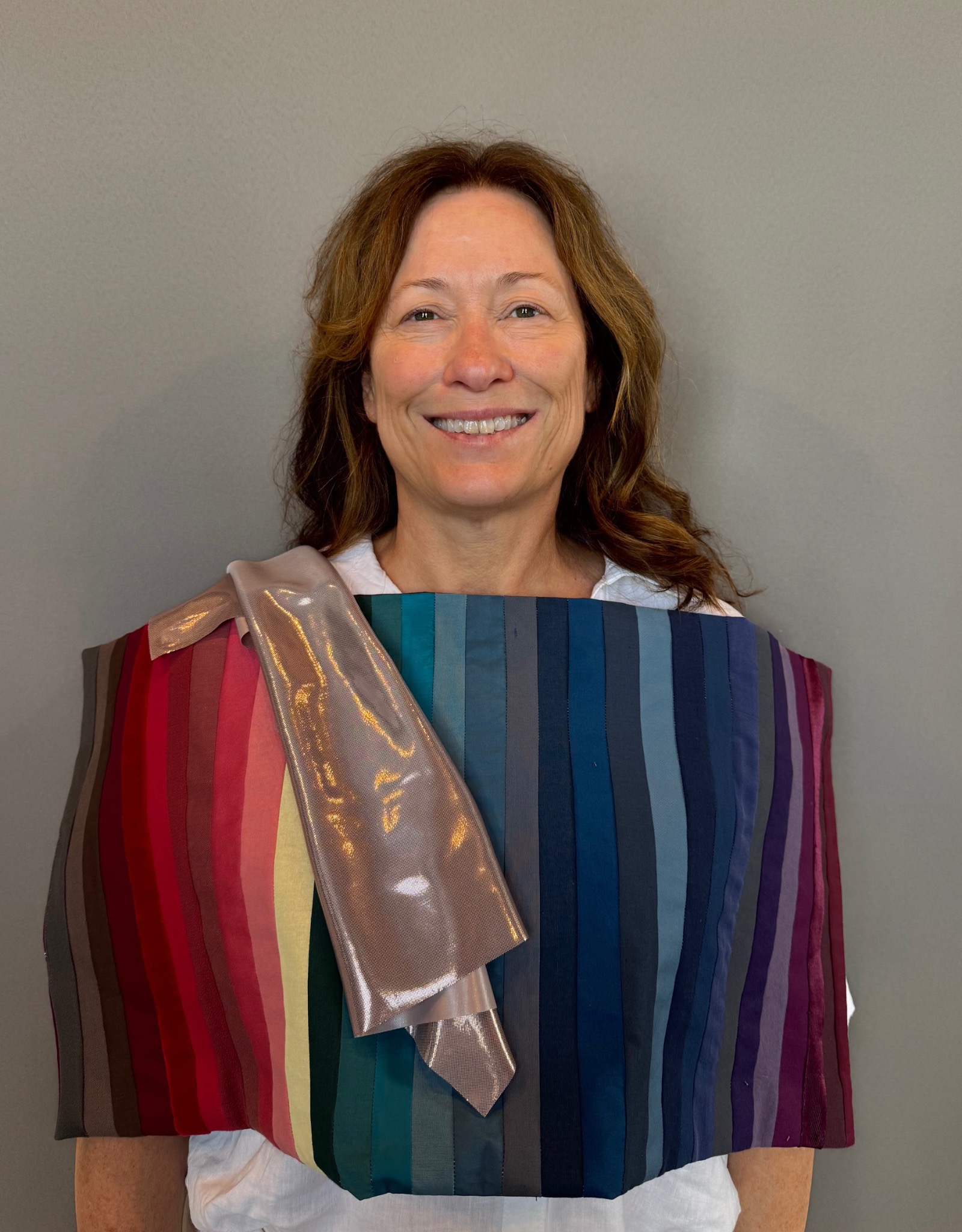 Happy Hue Method client smiling with her personalized color palette